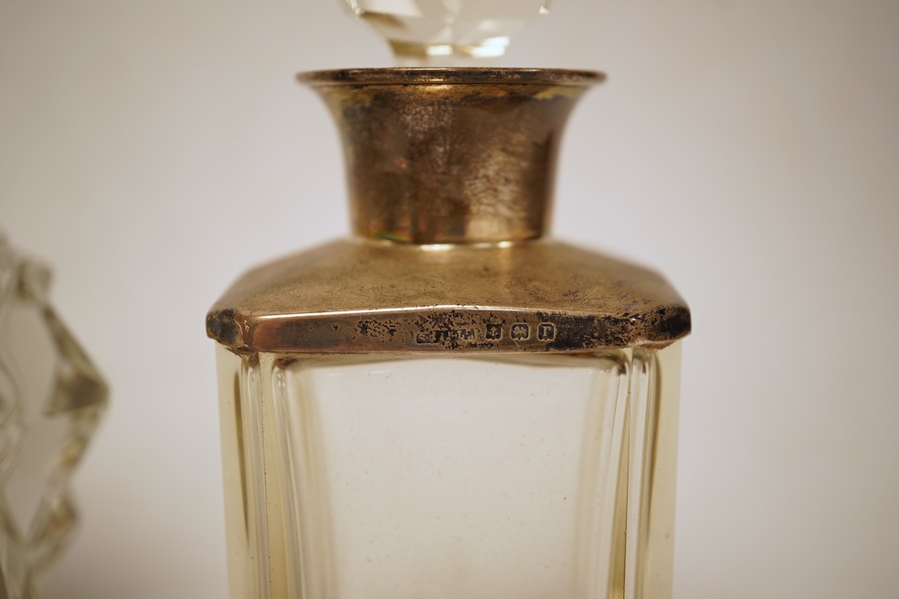 A Victorian engraved silver snuff box, Yapp & Woodward, Birmingham, 1899, 68mm, a small silver scent bottle and two silver-mounted glass scent bottles.